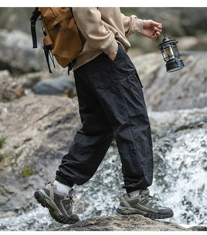 TFETTERS Autumn Men Cargo Pants 2025 Multi Pocket Waterproof Solid Color Casual Pants 100% Nylon Outdoors Tourism Men Clothes - Clikcy