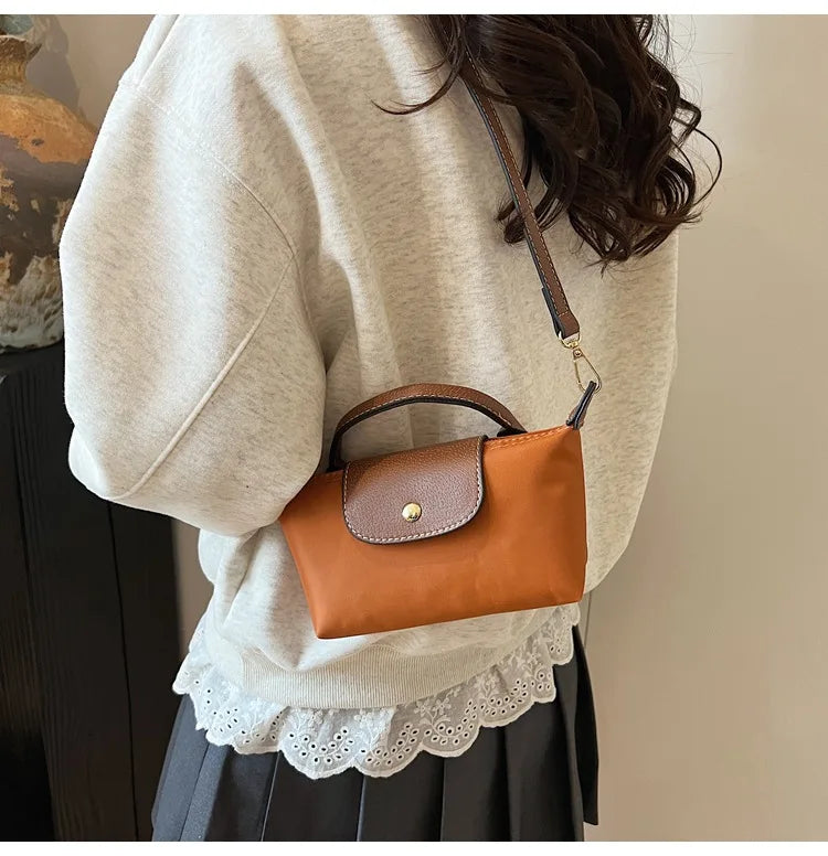 2025 summer lightweight shoulder crossbody bag, fashionable women's bag, plaid canvas, personalized and versatile dumpling bag