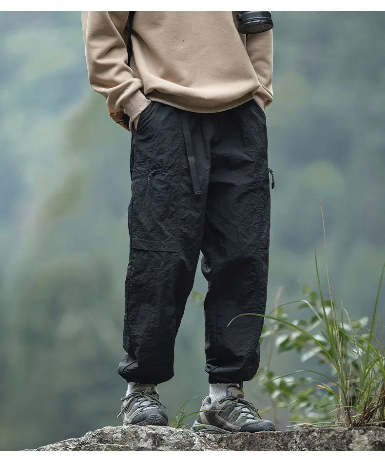 TFETTERS Autumn Men Cargo Pants 2025 Multi Pocket Waterproof Solid Color Casual Pants 100% Nylon Outdoors Tourism Men Clothes - Clikcy