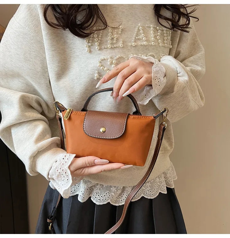 2025 summer lightweight shoulder crossbody bag, fashionable women's bag, plaid canvas, personalized and versatile dumpling bag