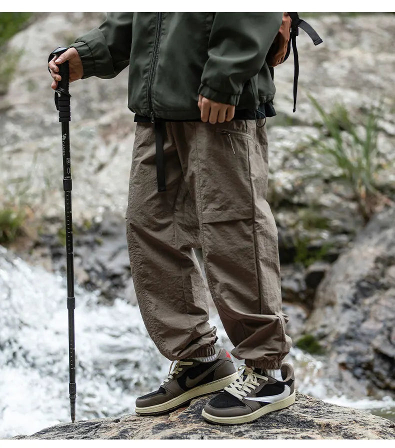 TFETTERS Autumn Men Cargo Pants 2025 Multi Pocket Waterproof Solid Color Casual Pants 100% Nylon Outdoors Tourism Men Clothes - Clikcy