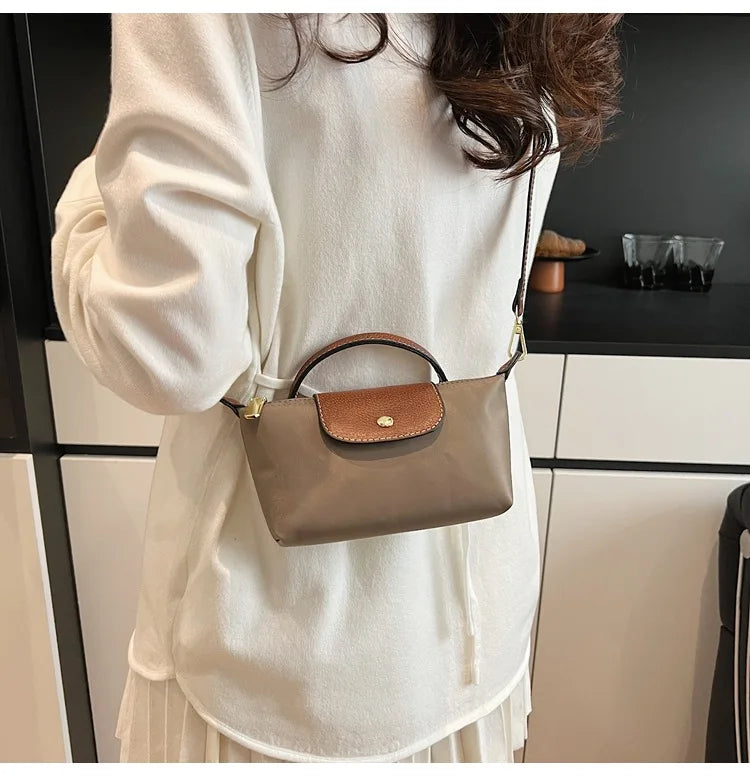 2025 summer lightweight shoulder crossbody bag, fashionable women's bag, plaid canvas, personalized and versatile dumpling bag