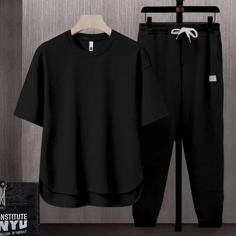 Men's Two-piece Breathable T-shirt Suit Round Hem Short-sleeved Trousers Loose Suit Monochrome Summer Trend - Clikcy