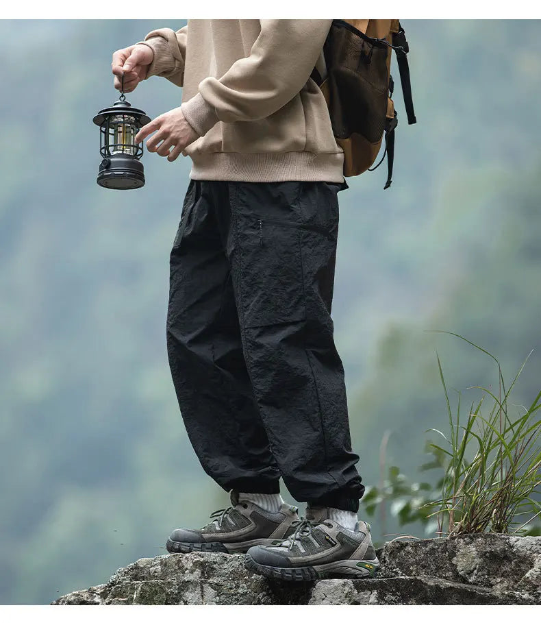 TFETTERS Autumn Men Cargo Pants 2025 Multi Pocket Waterproof Solid Color Casual Pants 100% Nylon Outdoors Tourism Men Clothes - Clikcy
